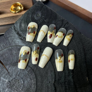 Set of decorative nail art on a wooden surface